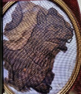 Embroidered textiles wrapped round King John's body